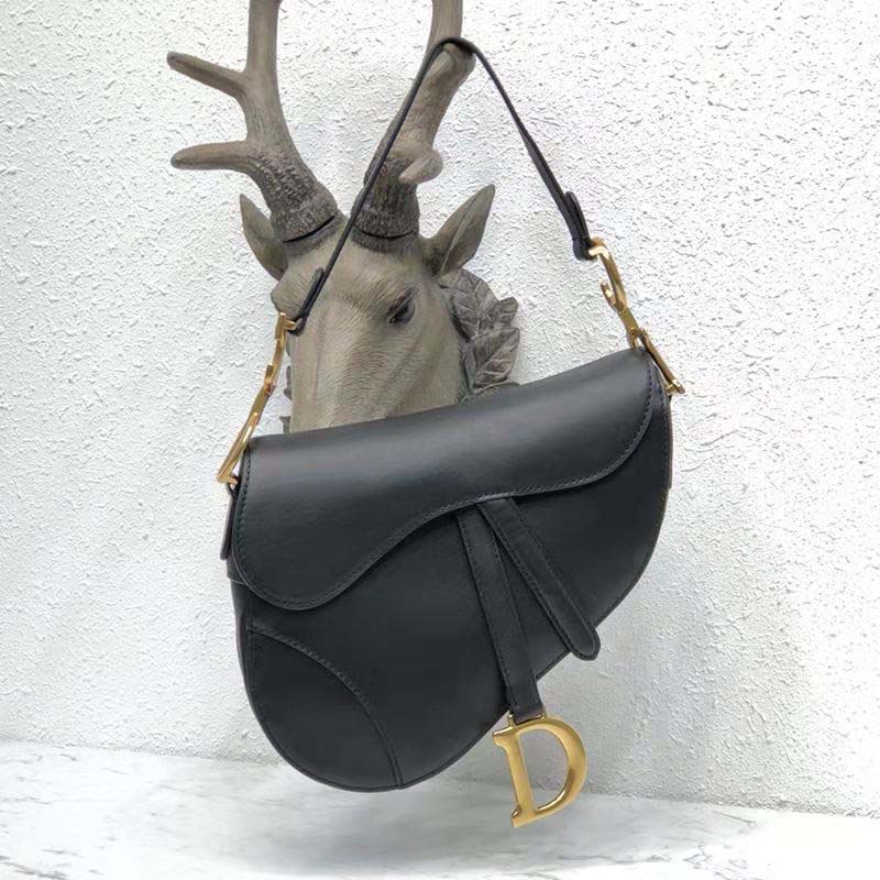 Mini saddle bag in black online calfskin