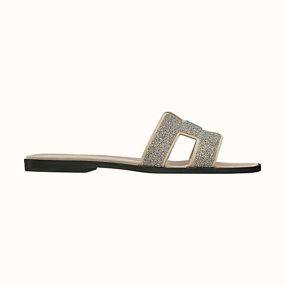 Hermes Women Oran Sandal Hermes Sandal in Metallic Nappa Leather and Cristal Powder-Sandy