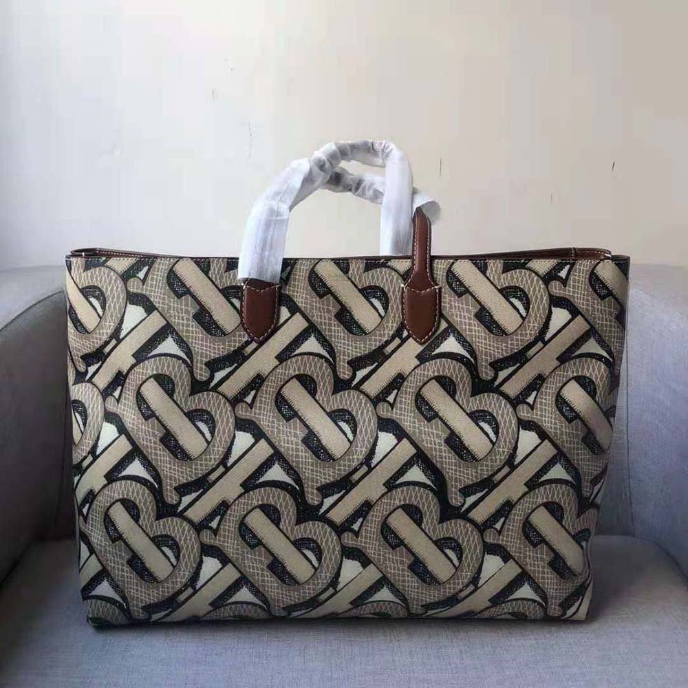 BURBERRY: e-canvas tote bag with monogram print - Brown