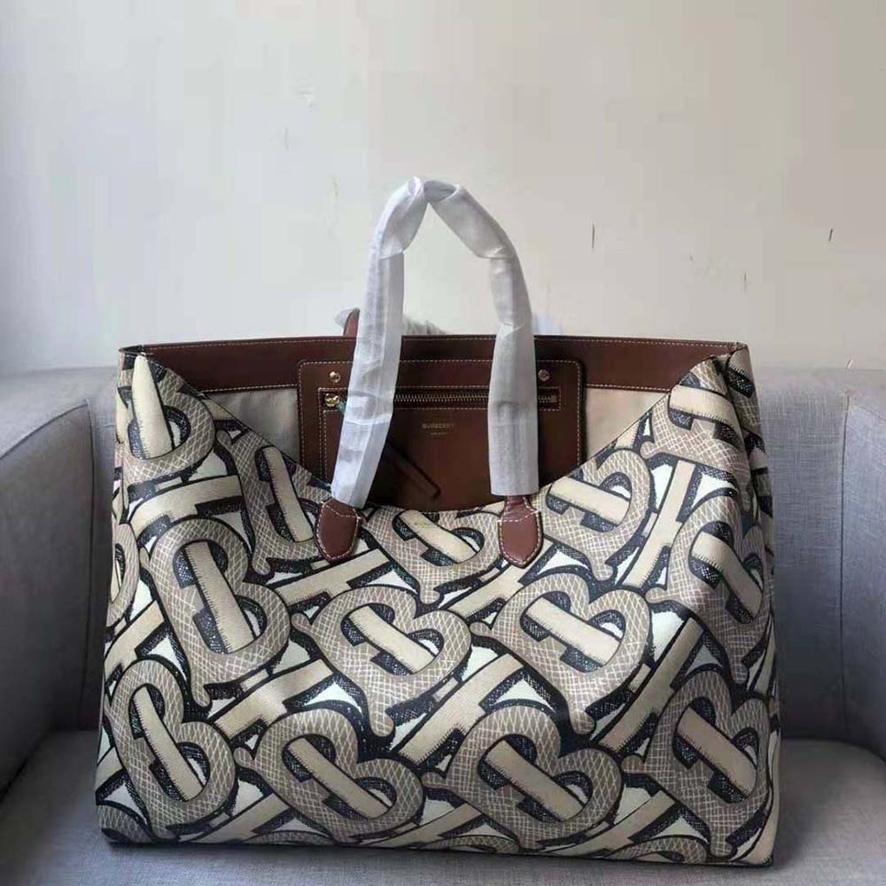 BURBERRY: e-canvas tote bag with monogram print - Brown