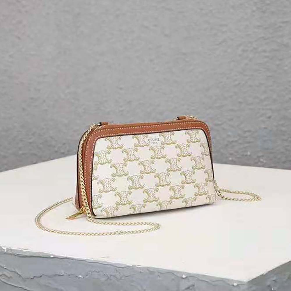 Shop CELINE Clutch with chain in triomphe canvas and lambskin