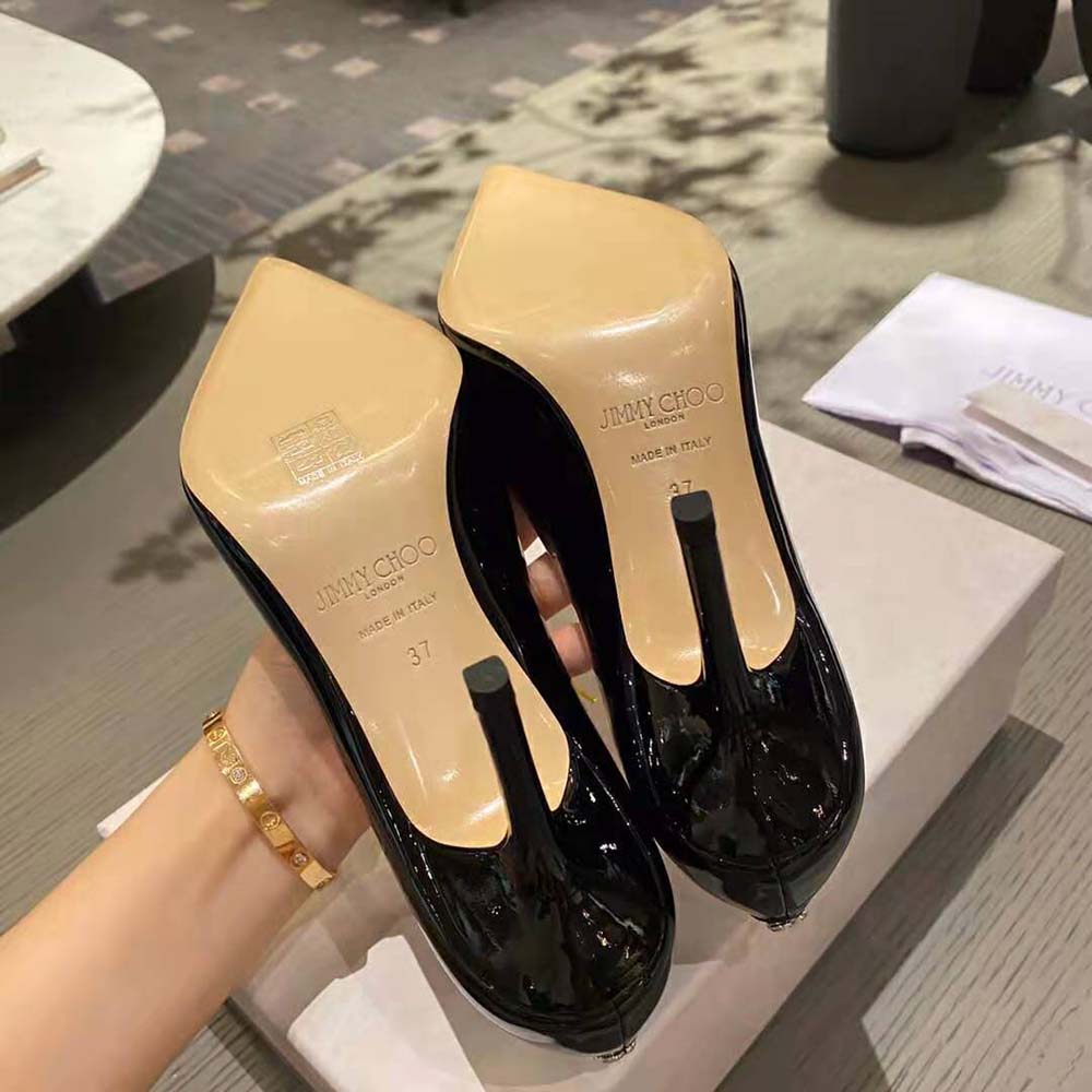 Black Patent Leather Pointed-Toe Pumps with JC Emblem
