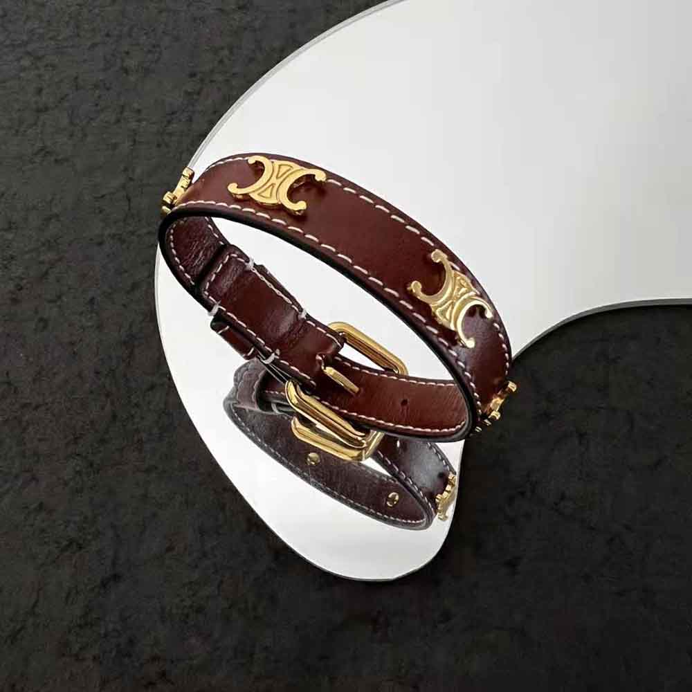 TRIOMPHE LEATHER BRACELET IN BRASS WITH GOLD FINISH AND CALFSKIN