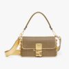 Fendi Women Baguette Brooch Fendace Bag in Gold Perforated Leather