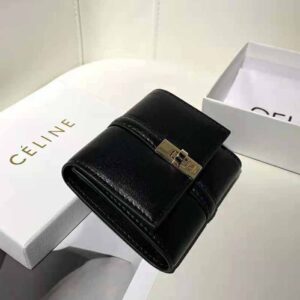 Shop CELINE 16 Small trifold wallet in shiny calfskin (10F523CQ7