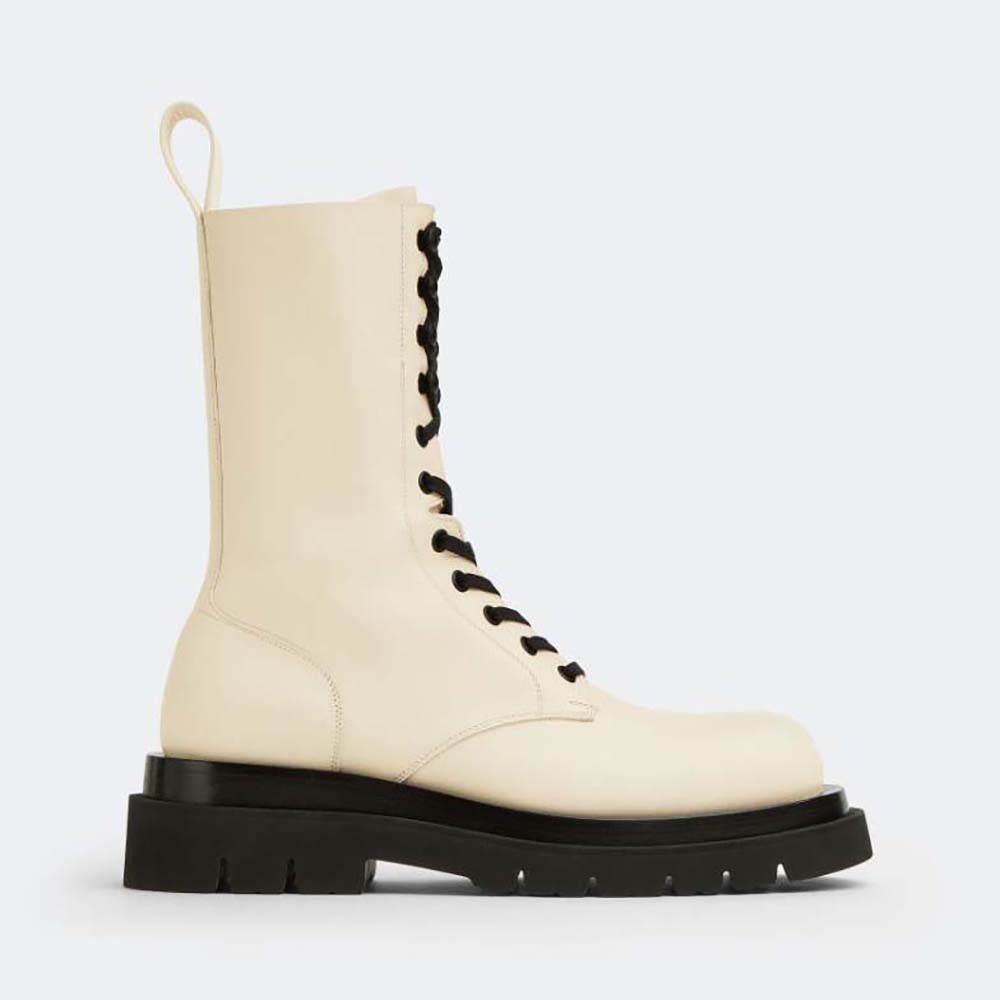 BOTTEGA VENETA 26S LUG ANKLE BOOTS IN BLACK CALFSKIN AND WHITE WOOL