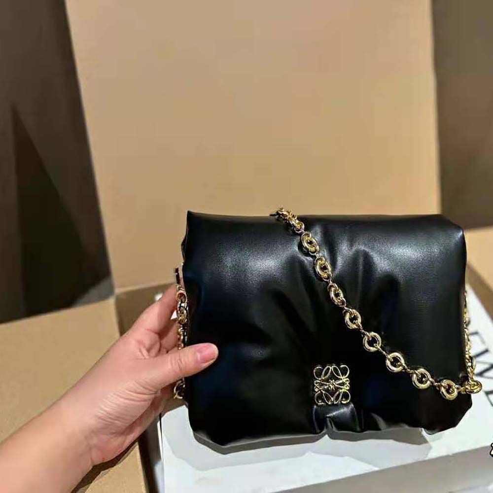 Buy Loewe Puffer Goya bag in black shiny nappa lambskin at the Park Avenue  boutique. Loewe Puffer Goya bag in black shiny nappa lambskin from the best  world brands with delivery across