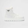 Prada Women Leather and Shearling High-Top Sneakers-White