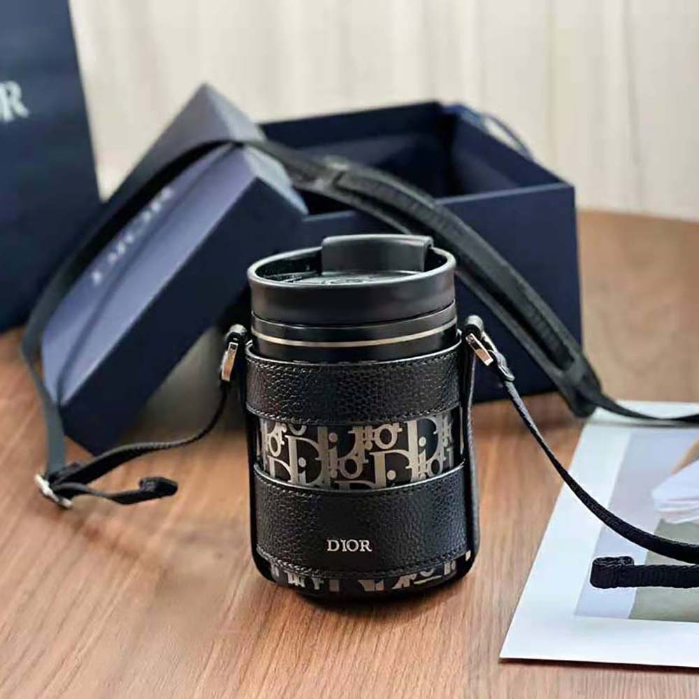 https://brands-hub.ru/wp-content/uploads/2023/03/Dior-Unisex-Aqua-Mug-with-Shoulder-Strap-Black-Grained-Calfskin-and-Dior-Oblique-Stainless-Steel-9.jpg