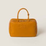 Miu Miu Women Leather Top-handle Bag with Embossed Lettering Logo-Orange
