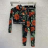 Dolce Gabbana D&G Women Spandex 2-piece Swimsuit with Rose Print Over a Black Background