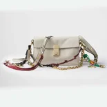 Prada Women Soft Sound Small Leather Shoulder Bag with Charms-White