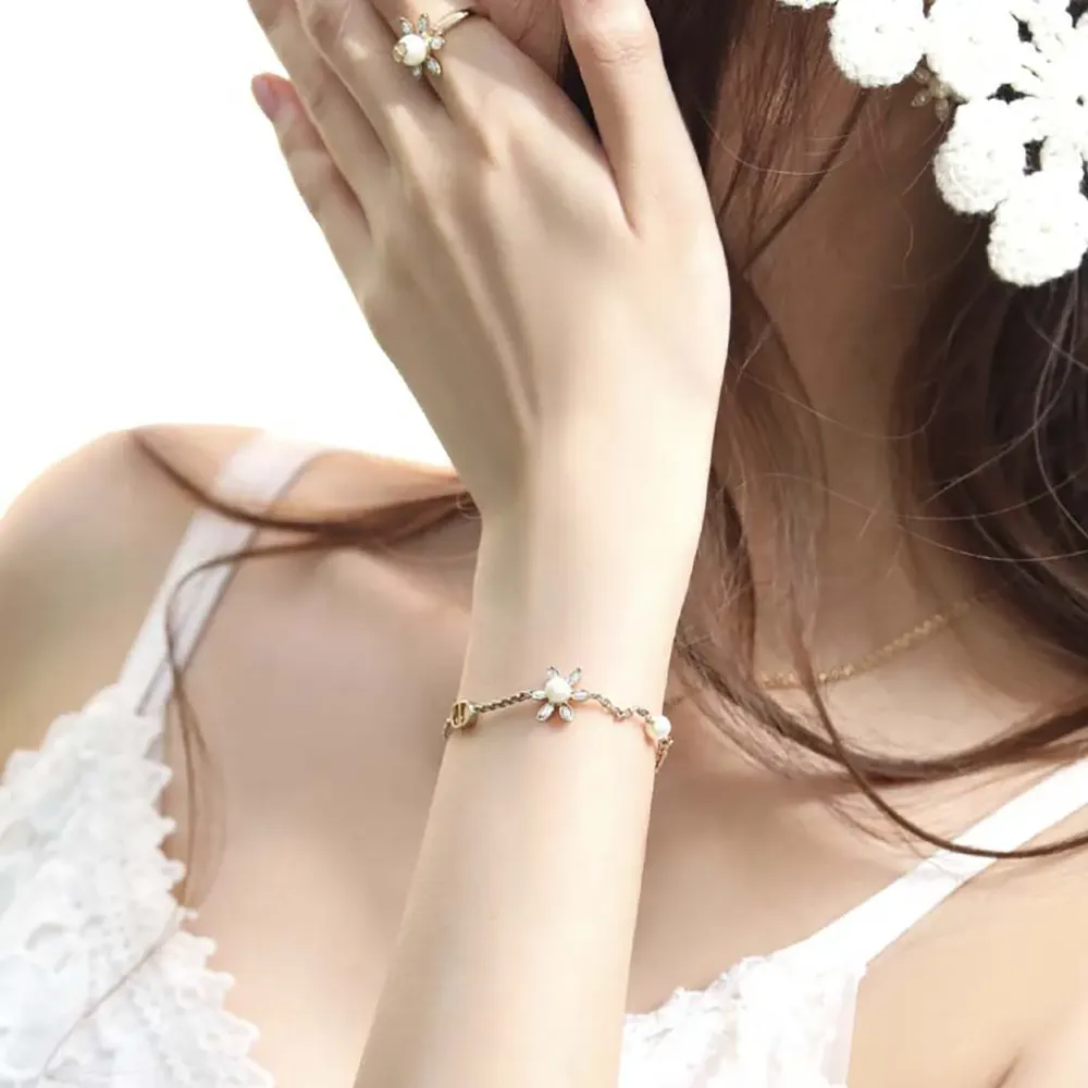 Dior Women Bloom in Dior Bracelet Gold-Finish Metal with White Resin Pearls and Silver-Tone Crystals 9 Dior Women Bloom in Dior Bracelet Gold-Finish Metal with White Resin Pearls and Silver-Tone Crystals