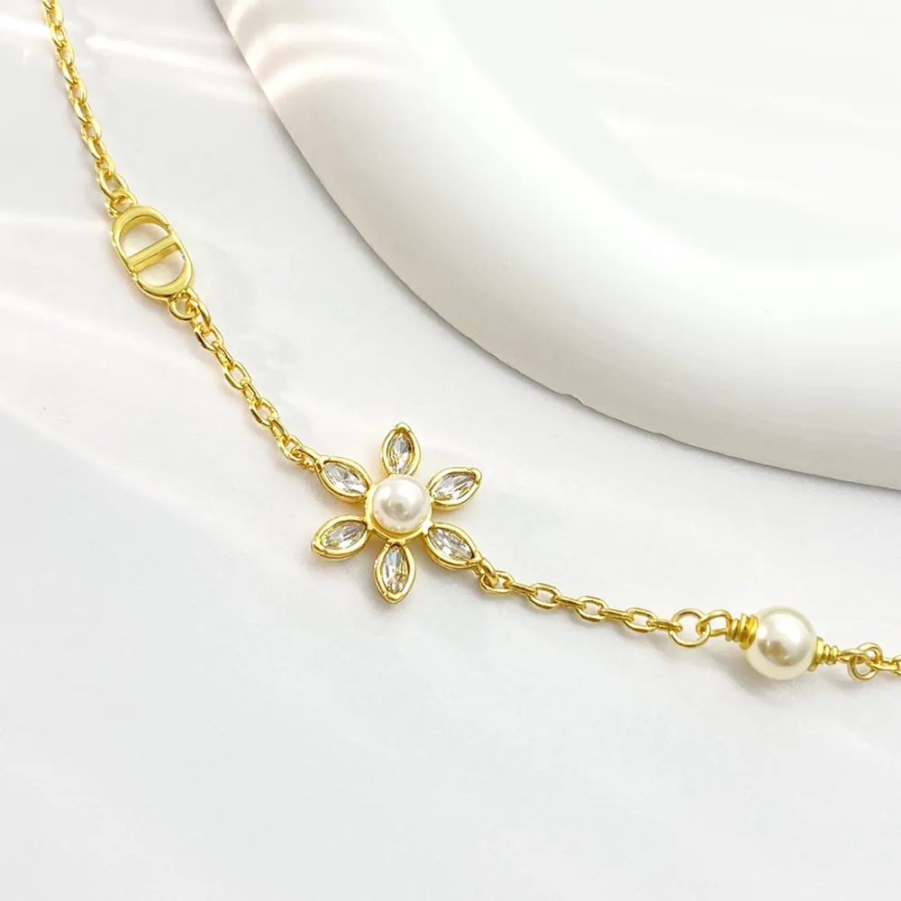Dior Women Bloom in Dior Bracelet Gold-Finish Metal with White Resin Pearls and Silver-Tone Crystals 6 Dior Women Bloom in Dior Bracelet Gold-Finish Metal with White Resin Pearls and Silver-Tone Crystals
