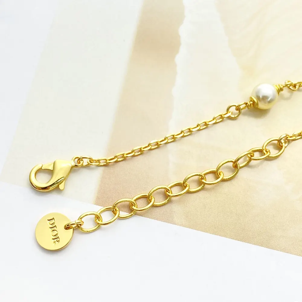 Dior Women Bloom in Dior Bracelet Gold-Finish Metal with White Resin Pearls and Silver-Tone Crystals 8 Dior Women Bloom in Dior Bracelet Gold-Finish Metal with White Resin Pearls and Silver-Tone Crystals