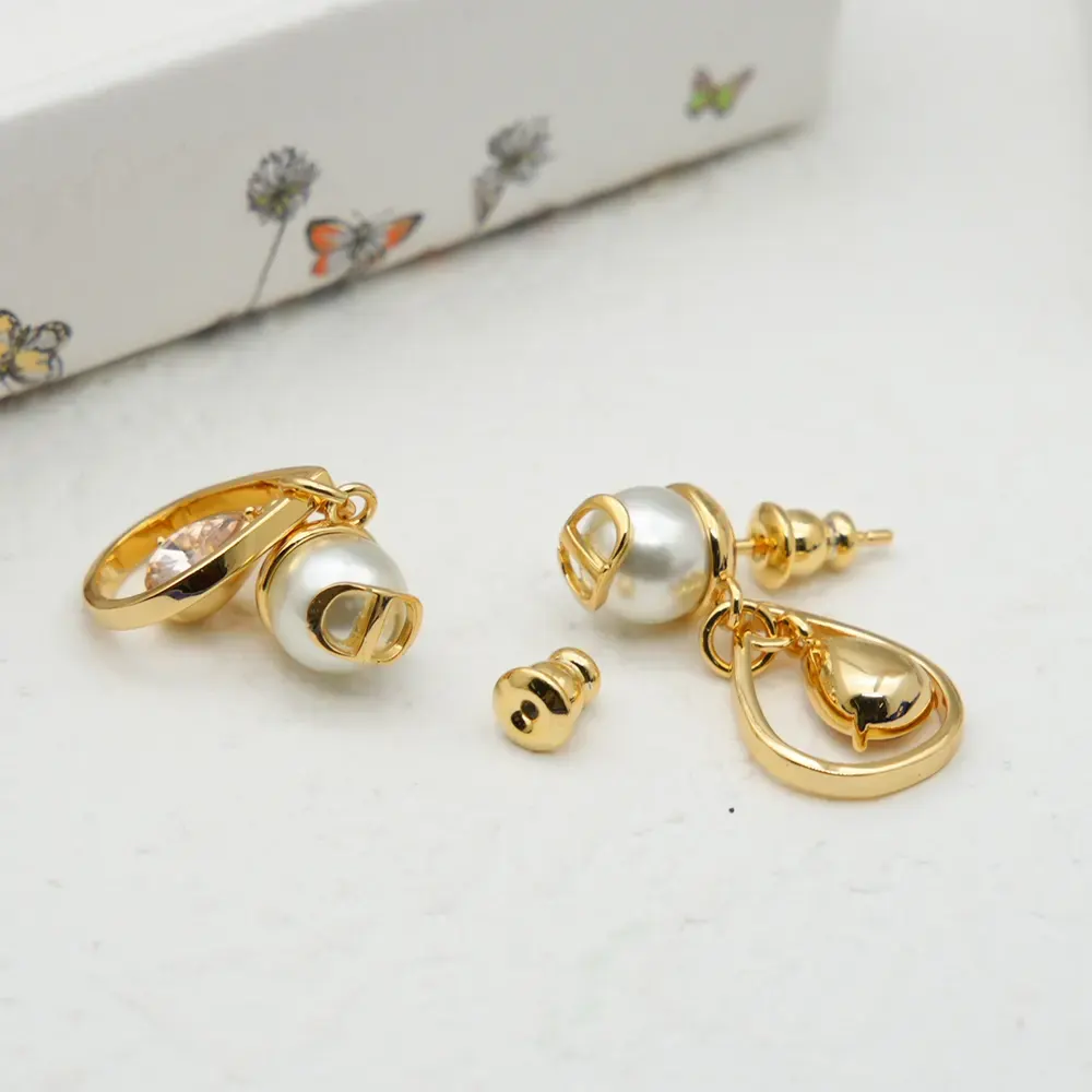 Dior Women D-Drop Earrings Gold-Finish Metal with White Resin Pearls and Champagne Crystals 5 Dior Women D-Drop Earrings Gold-Finish Metal with White Resin Pearls and Champagne Crystals
