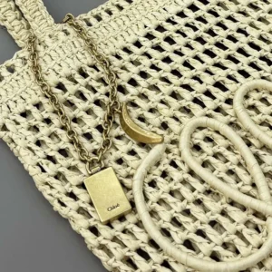 Chloe Women Small Summer Banana Tote Bag in Raffia-Sandy