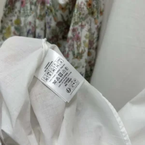Dior Women Mid-Length Flared Skirt Cotton Muslin with Multicolor Dior Flowers Calendar Allover Motif