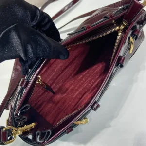 Prada Women Bonnie Small Leather Shoulder Bag-Maroon 1BH2152CYR