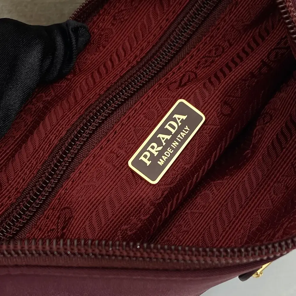Prada Women Re-Nylon Pouch Enameled Metal Triangle Logo 1NE545 9 Prada Women Re-Nylon Pouch Enameled Metal Triangle Logo 1NE545