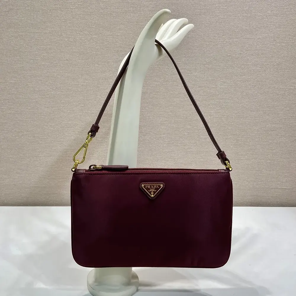 Prada Women Re-Nylon Pouch Enameled Metal Triangle Logo 1NE545 2 Prada Women Re-Nylon Pouch Enameled Metal Triangle Logo 1NE545