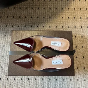 Alaia Women Le Cœur Mules In Patent Leather-Maroon AA3M053