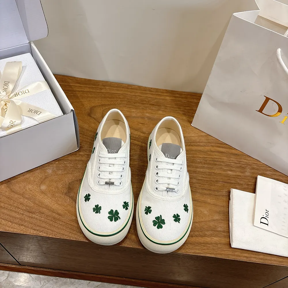 Dior Unisex Saltwind Sneaker White Cotton Embroidered with Bright Green Dior Clover Motif