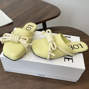 Loewe Women Flamenco Knot Mule in Lambskin-Yellow L815379X98