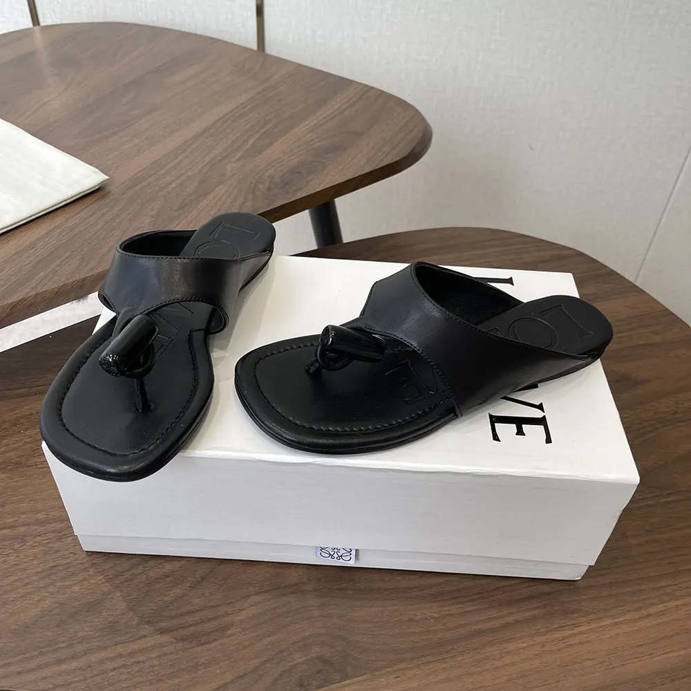 Loewe Women Toggle Flat Sandal in Shiny Smoot Calfskin-Black L815465XB9 4 Loewe Women Toggle Flat Sandal in Shiny Smoot Calfskin-Black L815465XB9