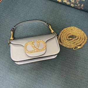Valentino Women Garavani Locò Small Shoulder Bag In Laminated Calfskin With Jewel Logo