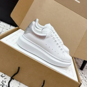 Alexander Mcqueen Unisex Oversized Sneaker in White/Silver 553770WI