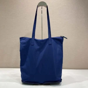 Prada Women Saffiano Leather Pendant With Re-Nylon Tote Bag-Baltic Blue
