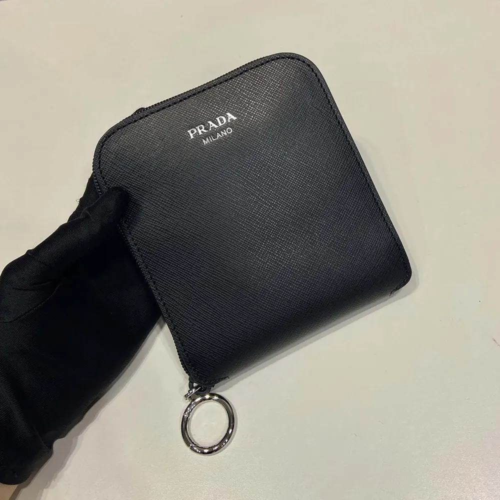 Prada Women Saffiano Leather Pendant With Re-Nylon Tote Bag-Black 9 Prada Women Saffiano Leather Pendant With Re-Nylon Tote Bag-Black