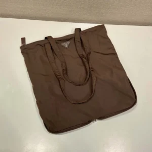 Prada Women Saffiano Leather Pendant With Re-Nylon Tote Bag-Sienna
