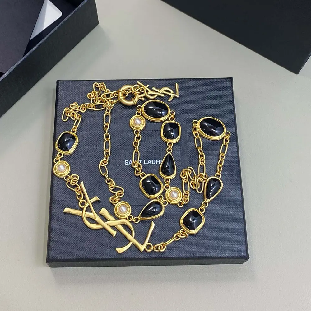 Saint Laurent YSL Women Cassandre Necklace in Enamel Resin and Metal 2 Saint Laurent YSL Women Cassandre Necklace in Enamel Resin And Metal