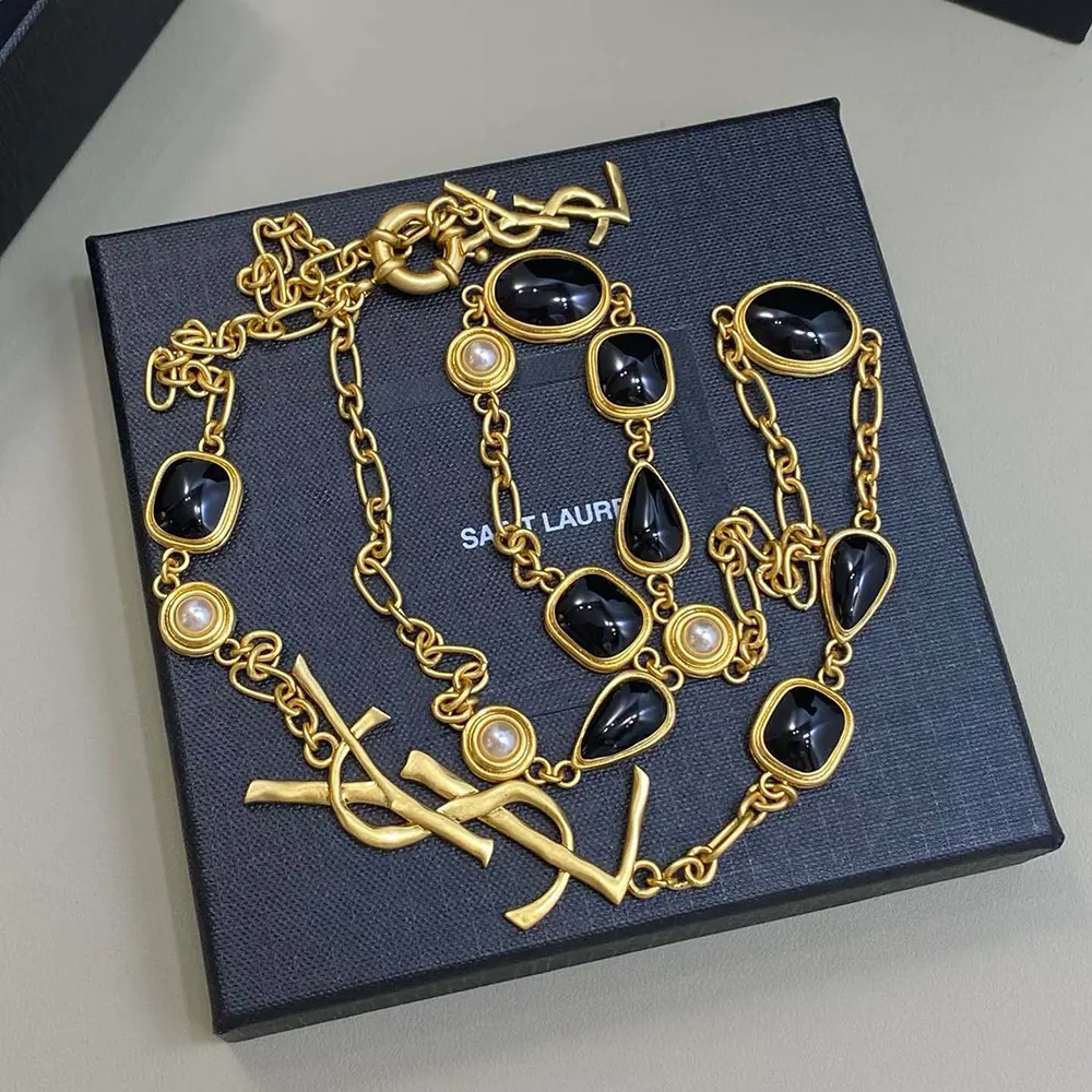 Saint Laurent YSL Women Cassandre Necklace in Enamel Resin and Metal 3 Saint Laurent YSL Women Cassandre Necklace in Enamel Resin And Metal