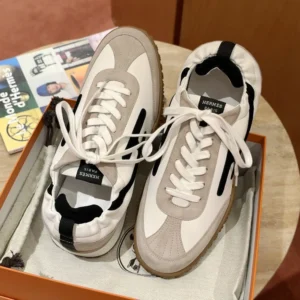 Sneaker in Nappa leather and suede goatskin with contrasting design and iconic "H" detail