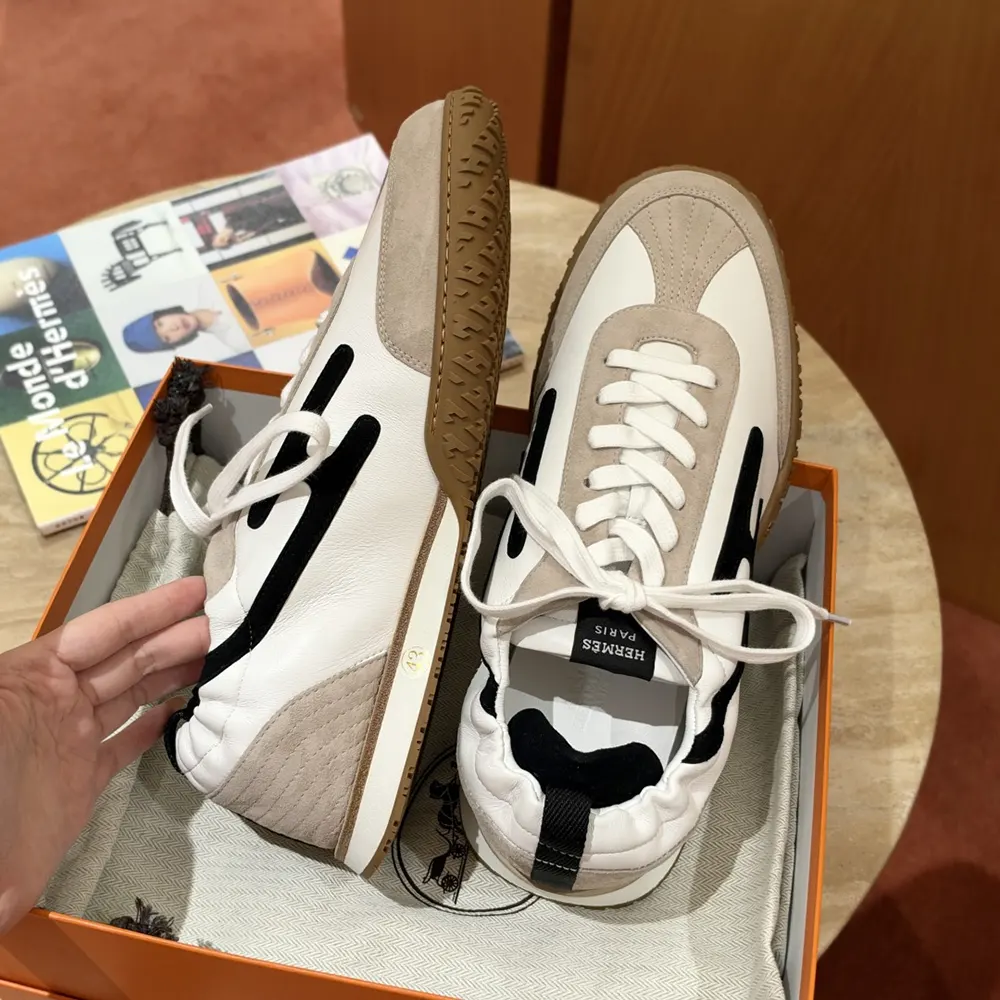 Hermes Unisex Jet Sneaker-Black H242154Z 04355 11 Sneaker in Nappa leather and suede goatskin with contrasting design and iconic "H" detail
