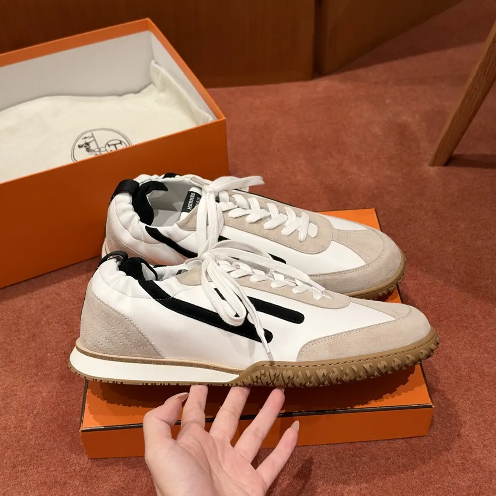 Hermes Unisex Jet Sneaker-Black H242154Z 04355 12 Sneaker in Nappa leather and suede goatskin with contrasting design and iconic "H" detail