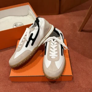 Sneaker in Nappa leather and suede goatskin with contrasting design and iconic "H" detail
