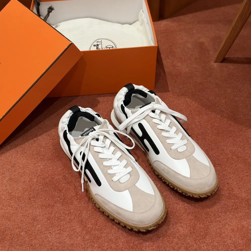 Hermes Unisex Jet Sneaker-Black H242154Z 04355 2 Sneaker in Nappa leather and suede goatskin with contrasting design and iconic "H" detail